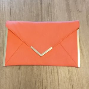 ASOS pink and gold envelope clutch